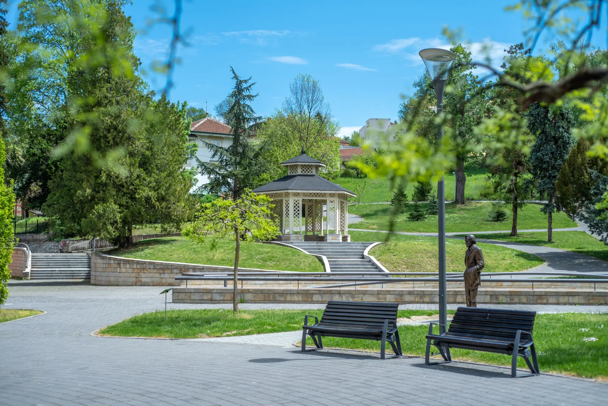 Famous park in Vrnjačka Banja, Serbia, with walking paths, greenery, and benches.