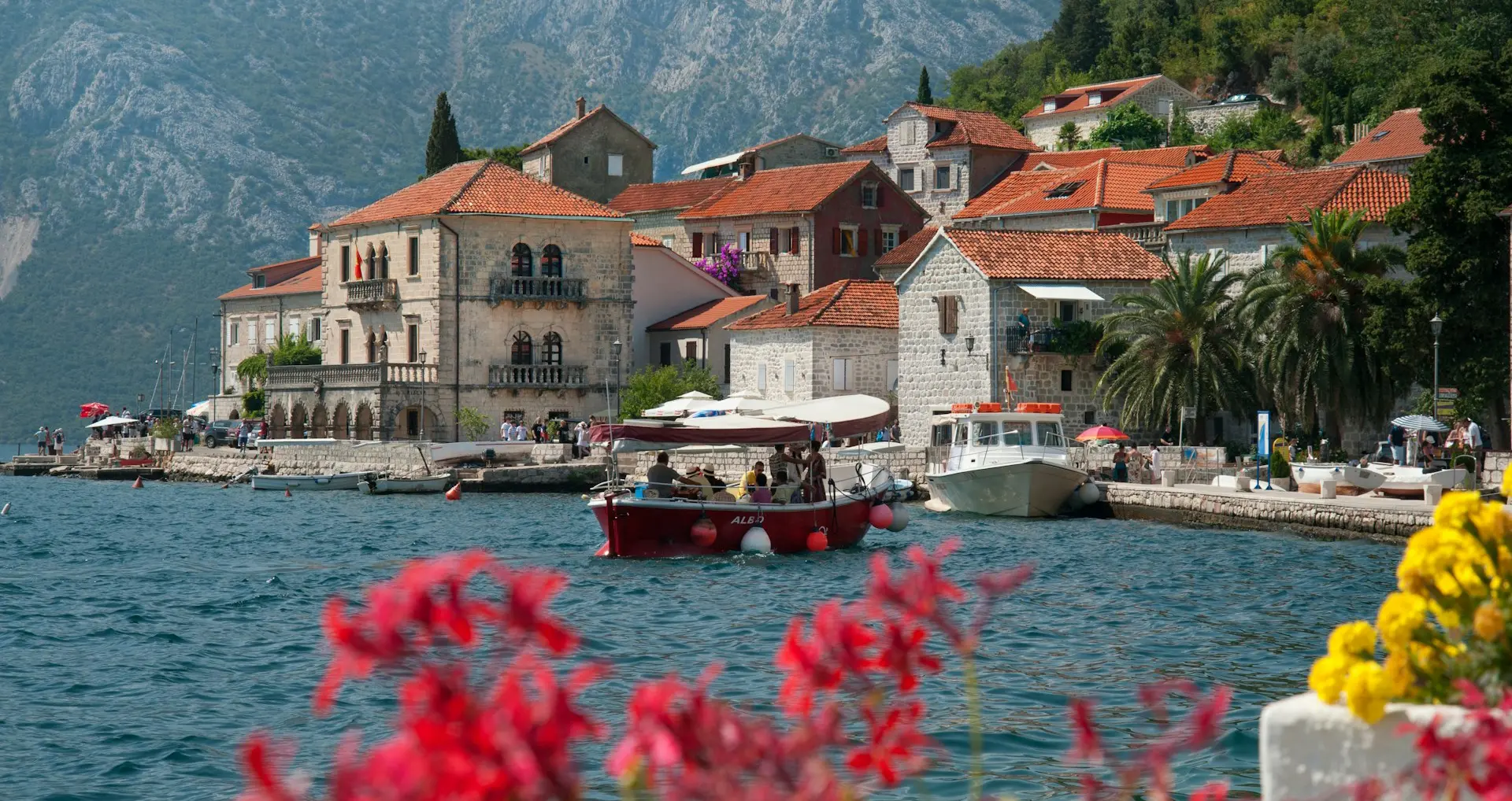 View of the Adriatic Sea with a boat in a scenic bay.
