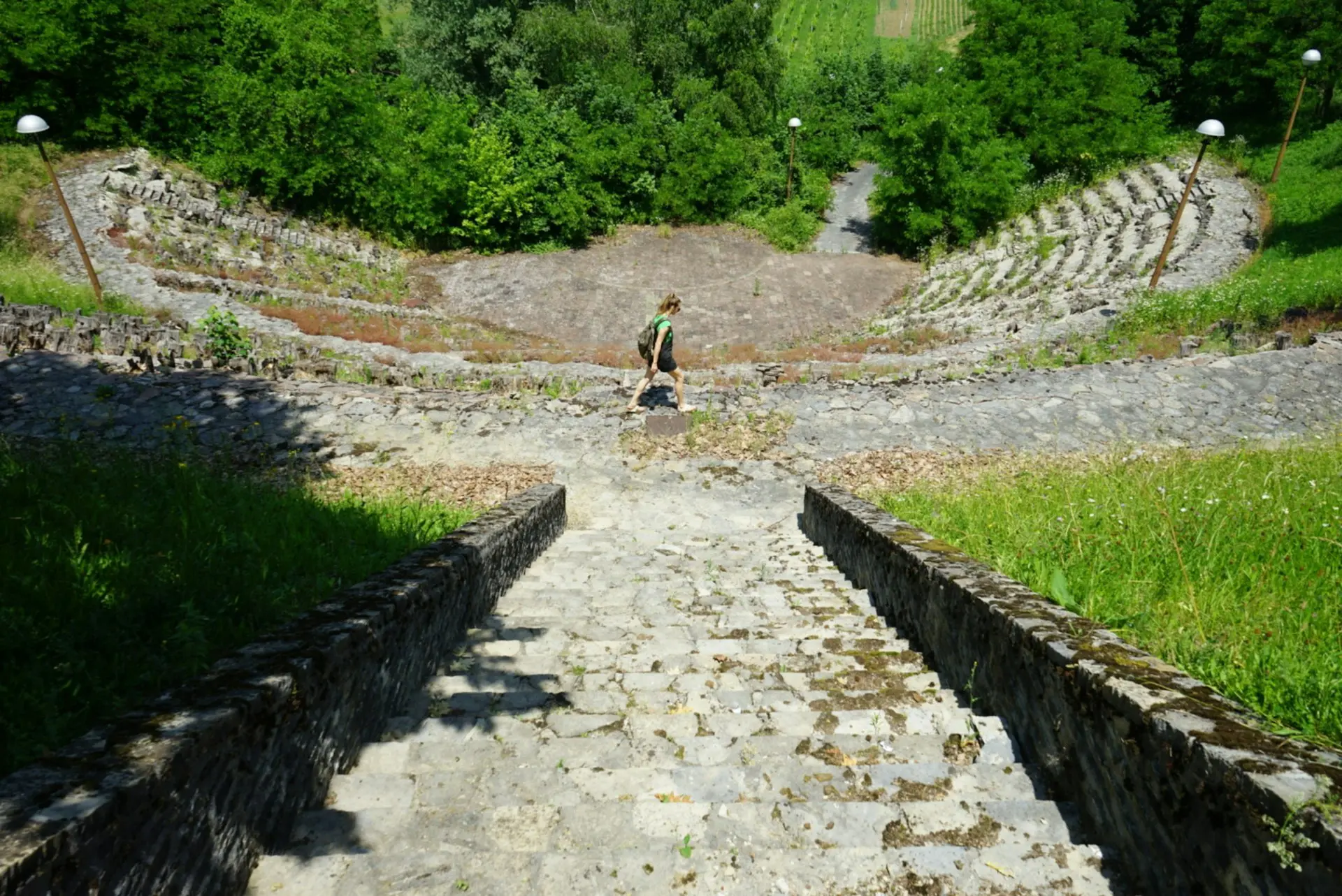 Woman walking through the scenic hills near Kumrovec, Croatia.